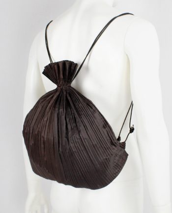 Issey Miyake dark brown drawstring backpack with fine pressed pleats