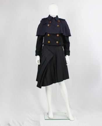 Comme des Garçons dark navy capelet from a cut off trenchcoat with orange buttons fall 2002