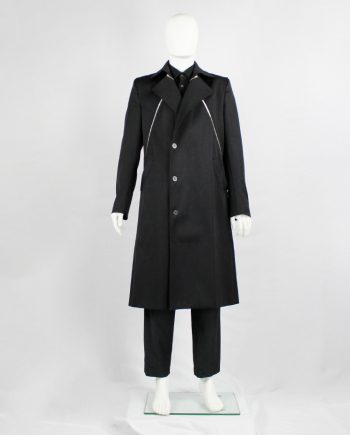 vintage Xavier Delcour black long coat with two silver zippers going from front to back 1990s 90s