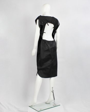 vintage Maison Martin Margiela H&M black backless dress modeled after a car seat cover 2012