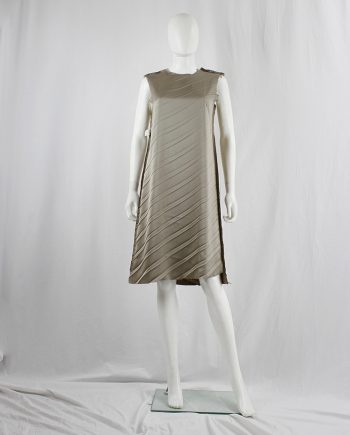 Maison Martin Margiela grey inside-out shift dress with diagonal pleats and frayed edges — fall 1993