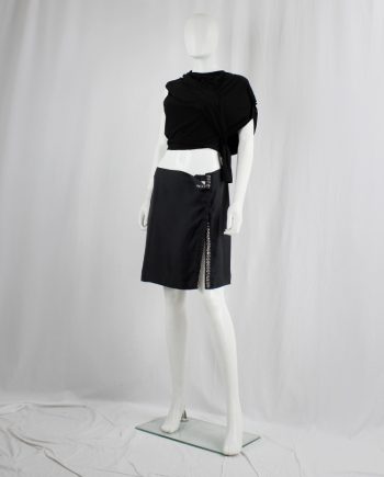 vintage Ann Demeulemeester black mini skirt with silver snap buttons along the full length spring 2001