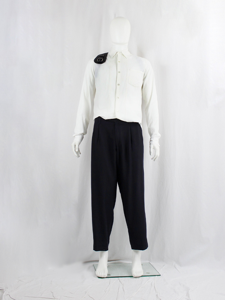 https://www.vaniitas.com/wp-content/uploads/2023/10/vintage-Ann-Demeulemeester-black-loose-mens-trousers-with-orange-waistband-and-pocket-lining-5.jpg