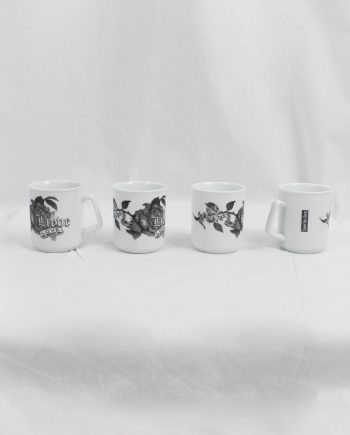 Lieve Van Gorp white coffee mugs with roses and Lieve Love printed in black 90s
