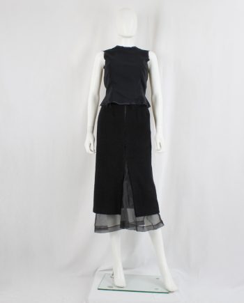 vintage Comme des Garcons black wool skirt with cutout and longer mesh lining fall 1997