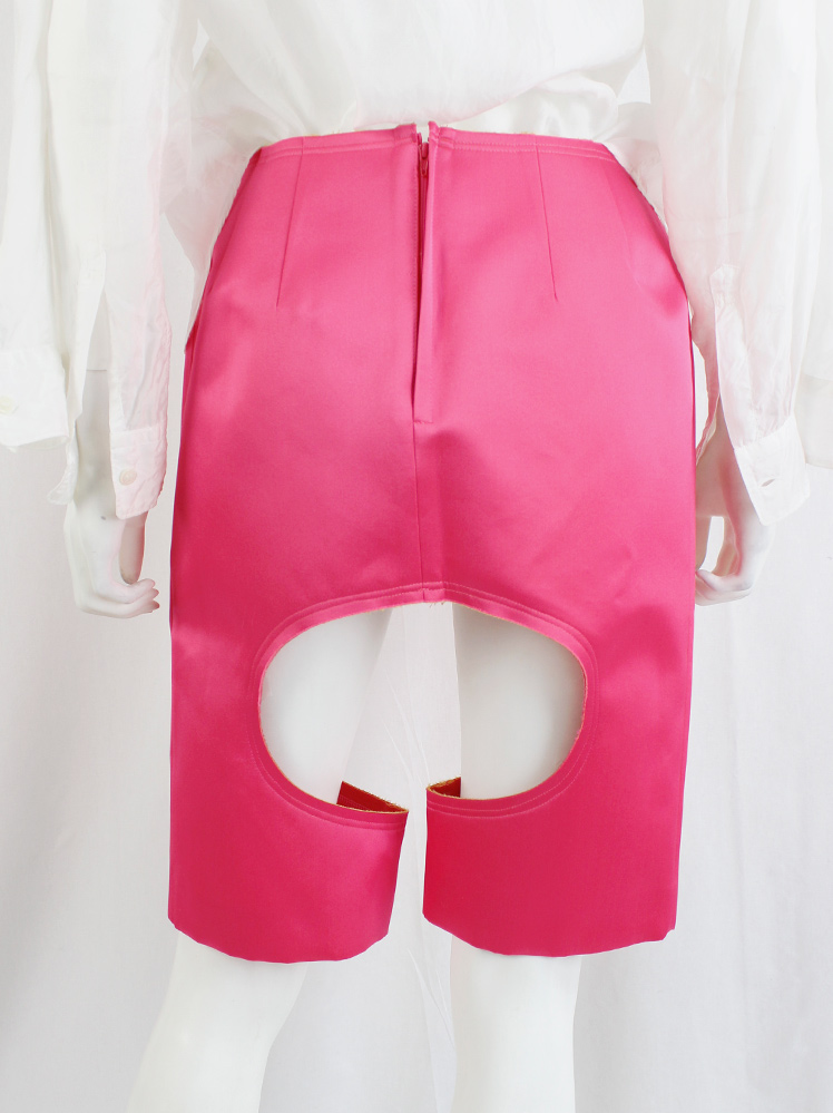 Comme des Garçons hot pink neoprene shorts with circular leg 